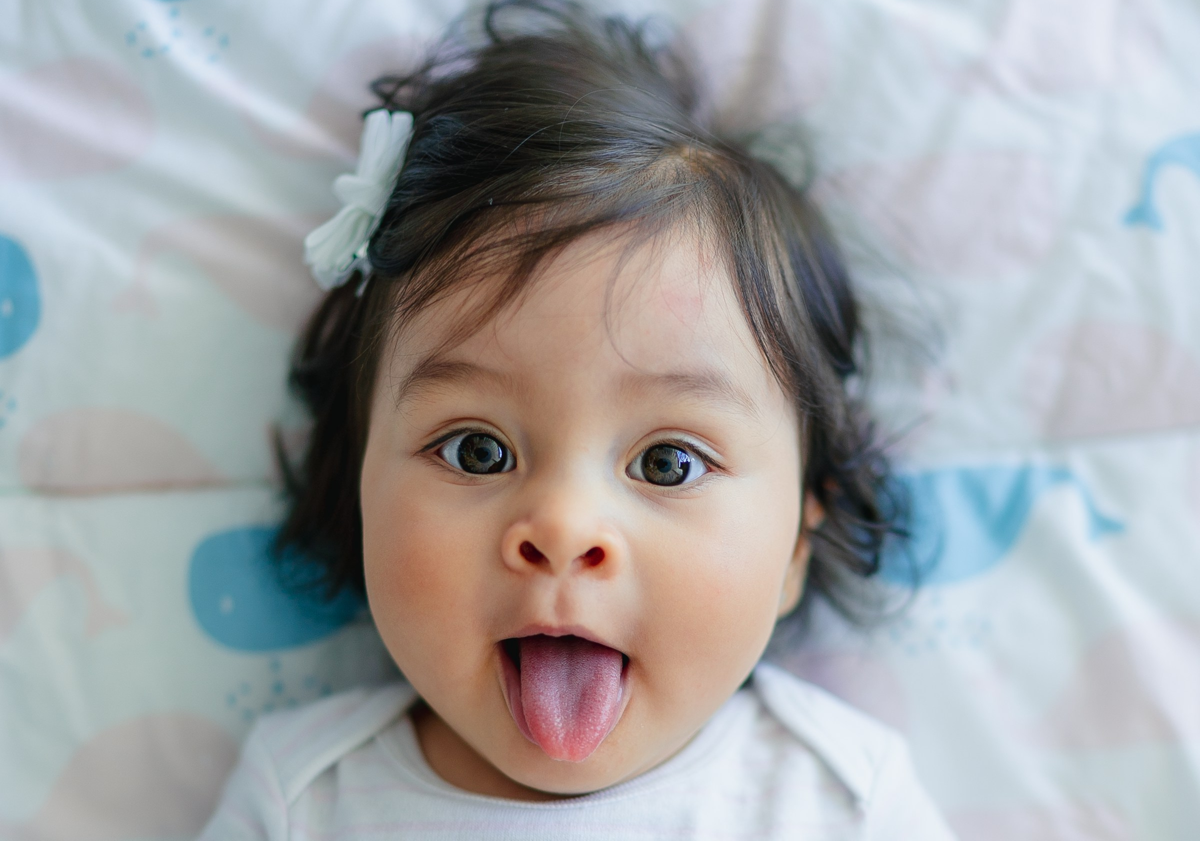 toddler spitting Toddler with tongue out